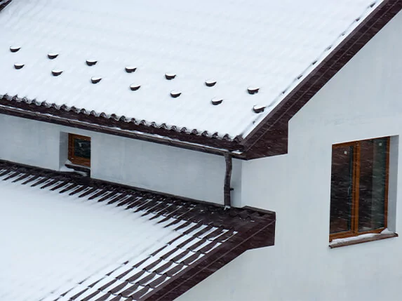 odśnieżanie dachów cena