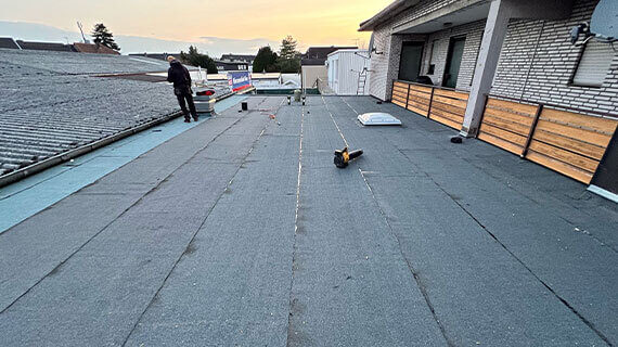 Układanie papy w Ubach-Palenberg przed po